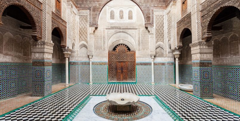 FES, MOROCCO - FEBRUARY 27, 2016: The Al-Attarine Madrasa is a madrasa in Fez medina in Morocco, near the Al-Qarawiyyin Fez Mosque